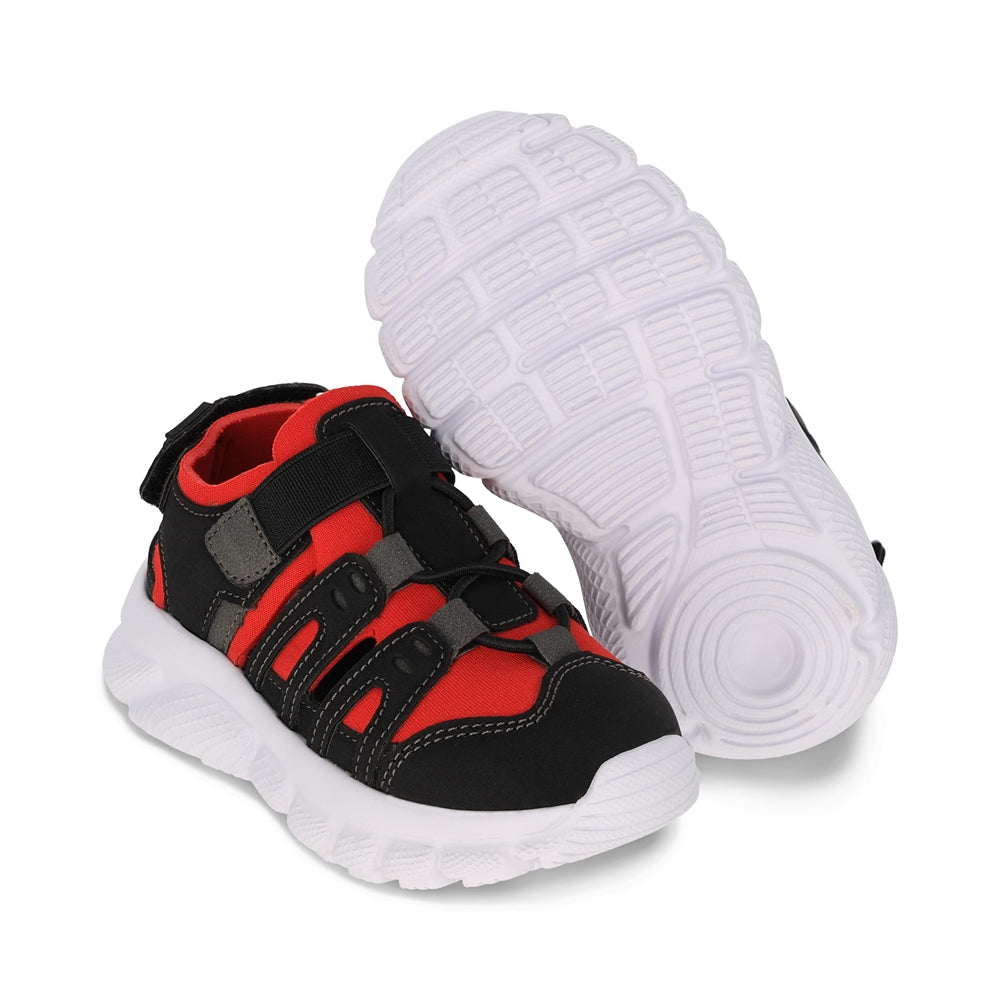 Sandalia Audaz para niño en sintético negro Waffle con tira de contacto