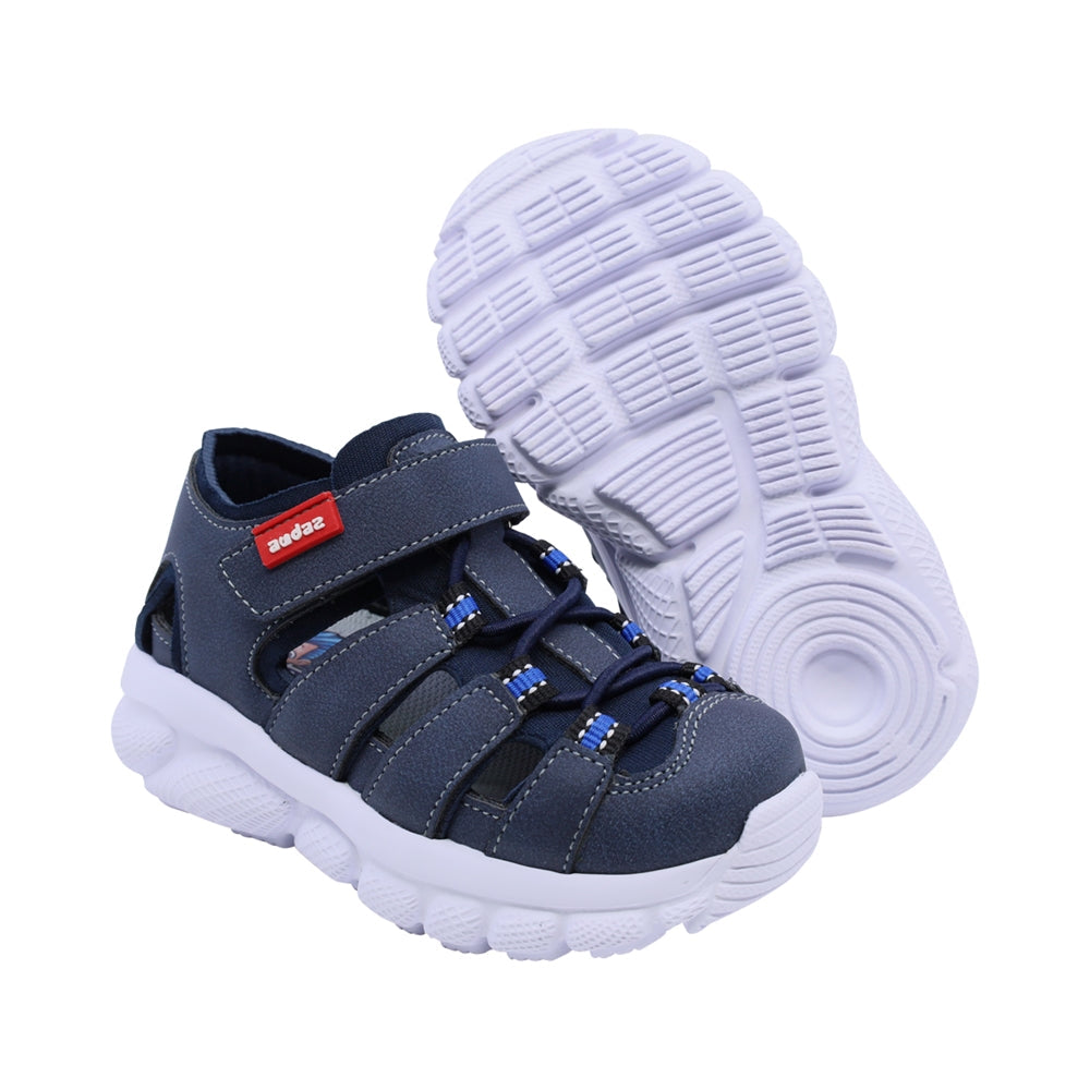 Sandalias para niño Audaz material sintético color azul waffle ajuste seguro con tira de contacto