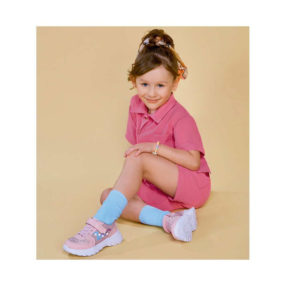 Jumper Coqueta para niña de poliéster en fiusha con ajuste en cintura