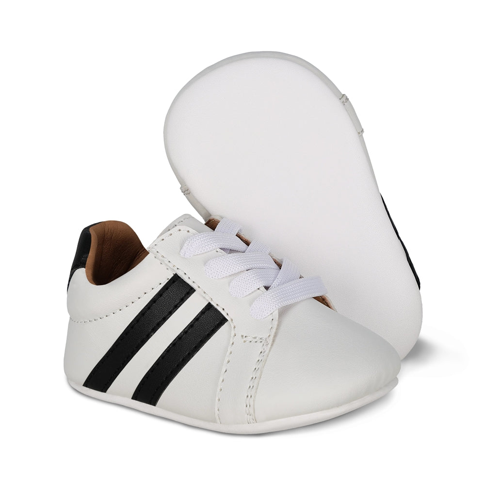 Tenis Audaz para niño en sintético blanco Daniel con agujeta elástica