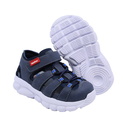 Sandalias para niño Audaz material sintético color azul waffle ajuste seguro con tira de contacto