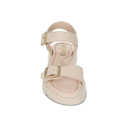 Sandalia Coqueta para niña en piel beige Tomasa con doble hebilla.