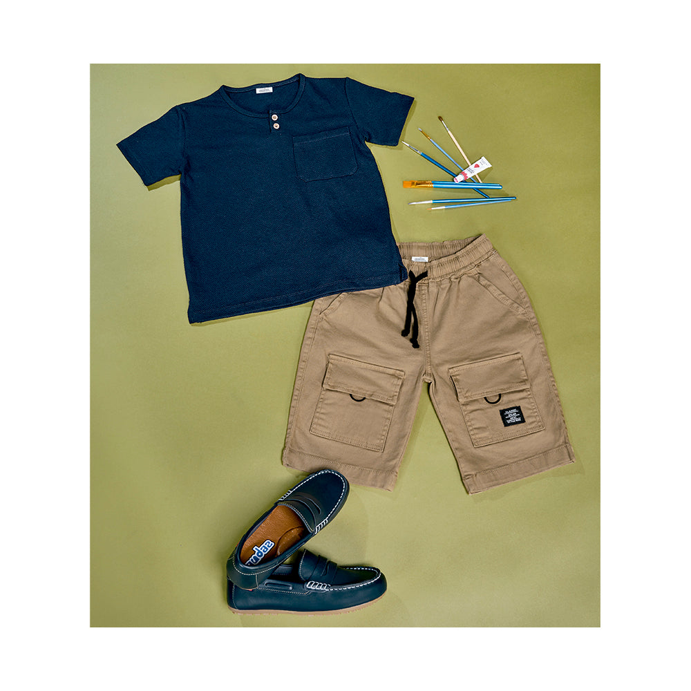 Playera Audaz para niño de algodón en  azul con botones y bolsillo