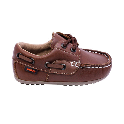 MOCASÍN AUDAZ PARA NIÑO COLOR CAFÉ CLARO DE PIEL MALAGA CON AGUJETA
