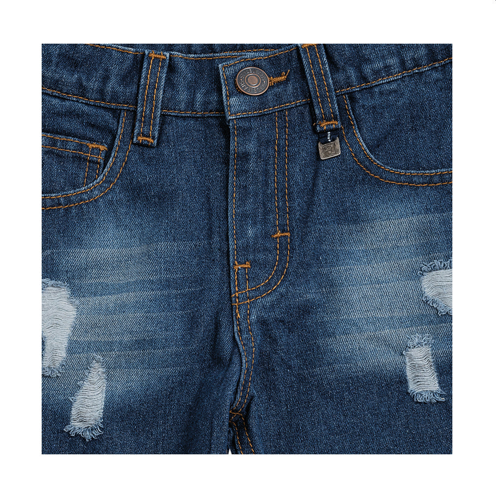 Jeans Audaz para niño de algodón azul marino con acabado deslavado