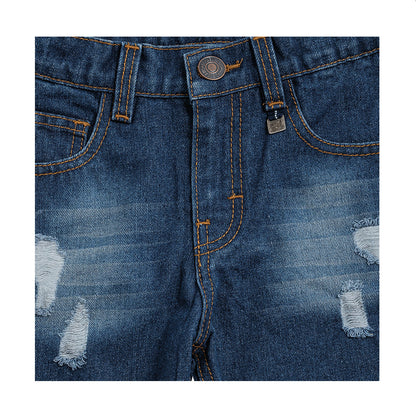 Jeans Audaz para niño de algodón azul marino con acabado deslavado