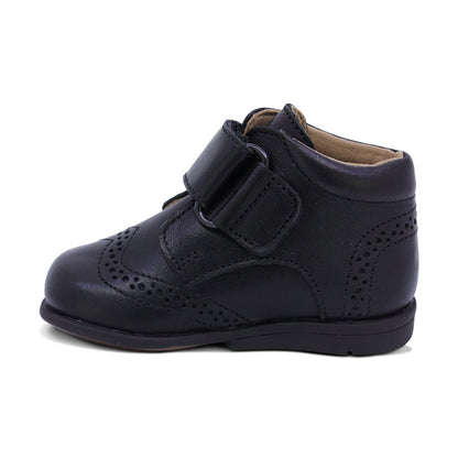 BOTITA AUDAZ PARA NIÑO DE PIEL COLOR NEGRO TOMY CON TIRA DE CONTACTO