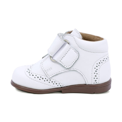 BOTITA AUDAZ PARA NIÑO DE PIEL COLOR BLANCO TOMY CON TIRA DE CONTACTO