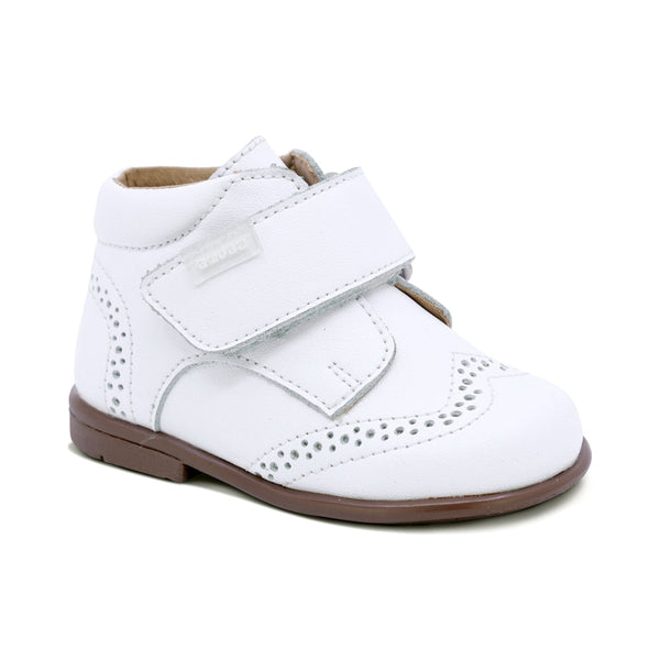 BOTITA AUDAZ PARA NIÑO DE PIEL COLOR BLANCO TOMY CON TIRA DE CONTACTO