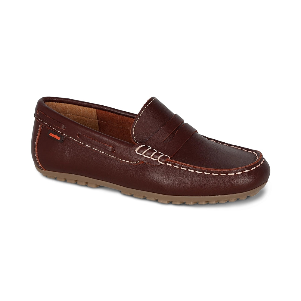 Mocasín Audaz para niño en piel  ladrillo Malaga con suela resistente.