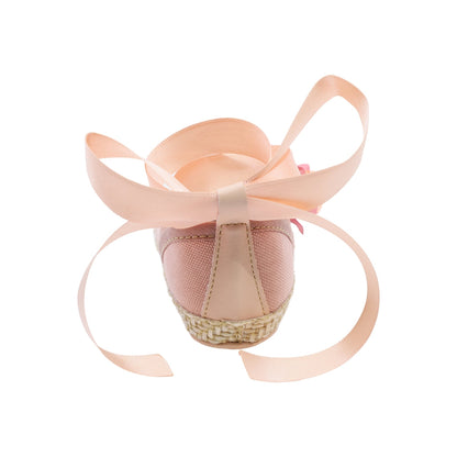Coqueta para niña en textil  rosa One con moño y flor decorativa